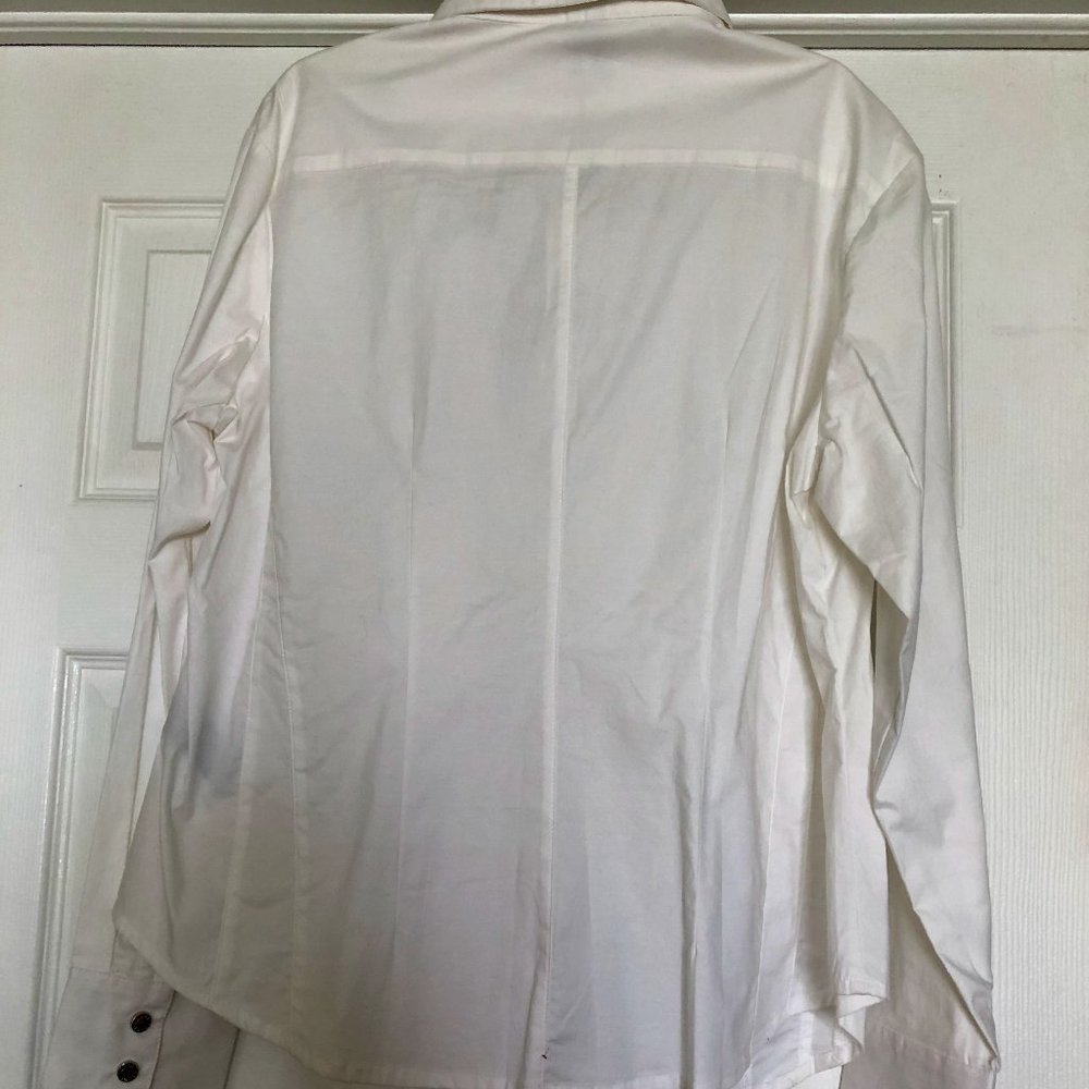 White long-sleeve blouse.